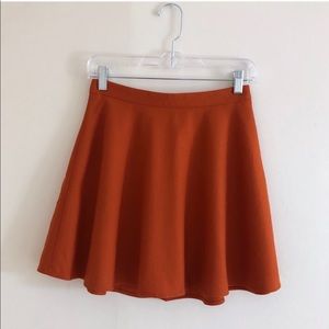 CLUB MONACO Mini Peplum Skirt in Orange